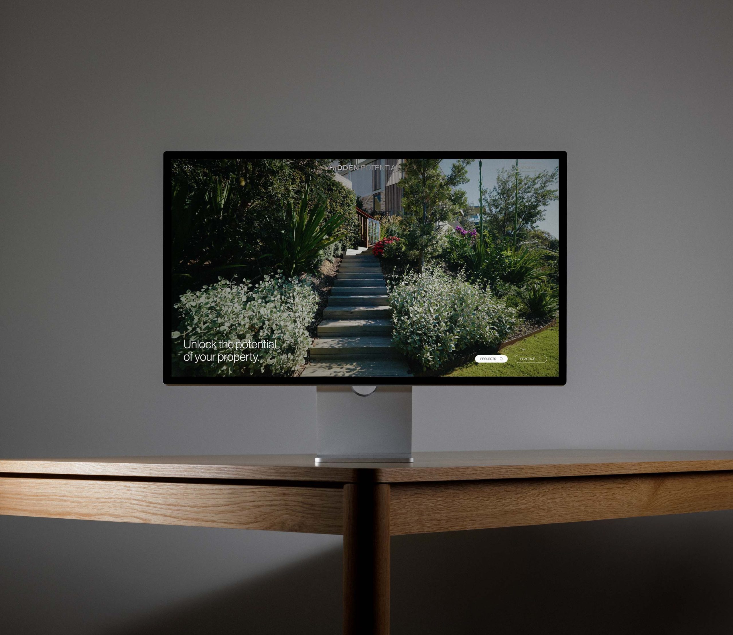 Hidden Potential Landscape Design website shown on a desktop display