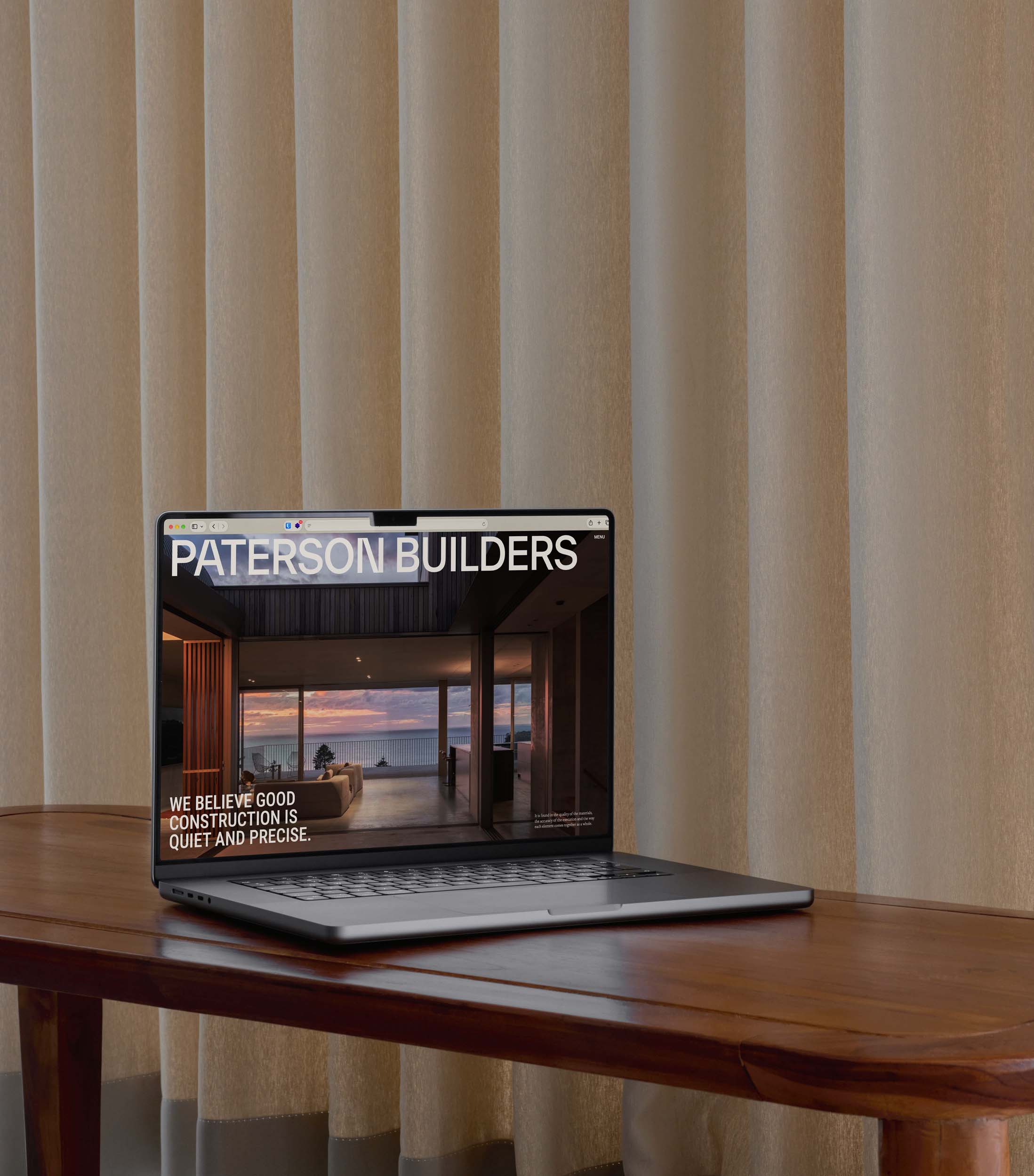 Paterson Builders website shown on a laptop