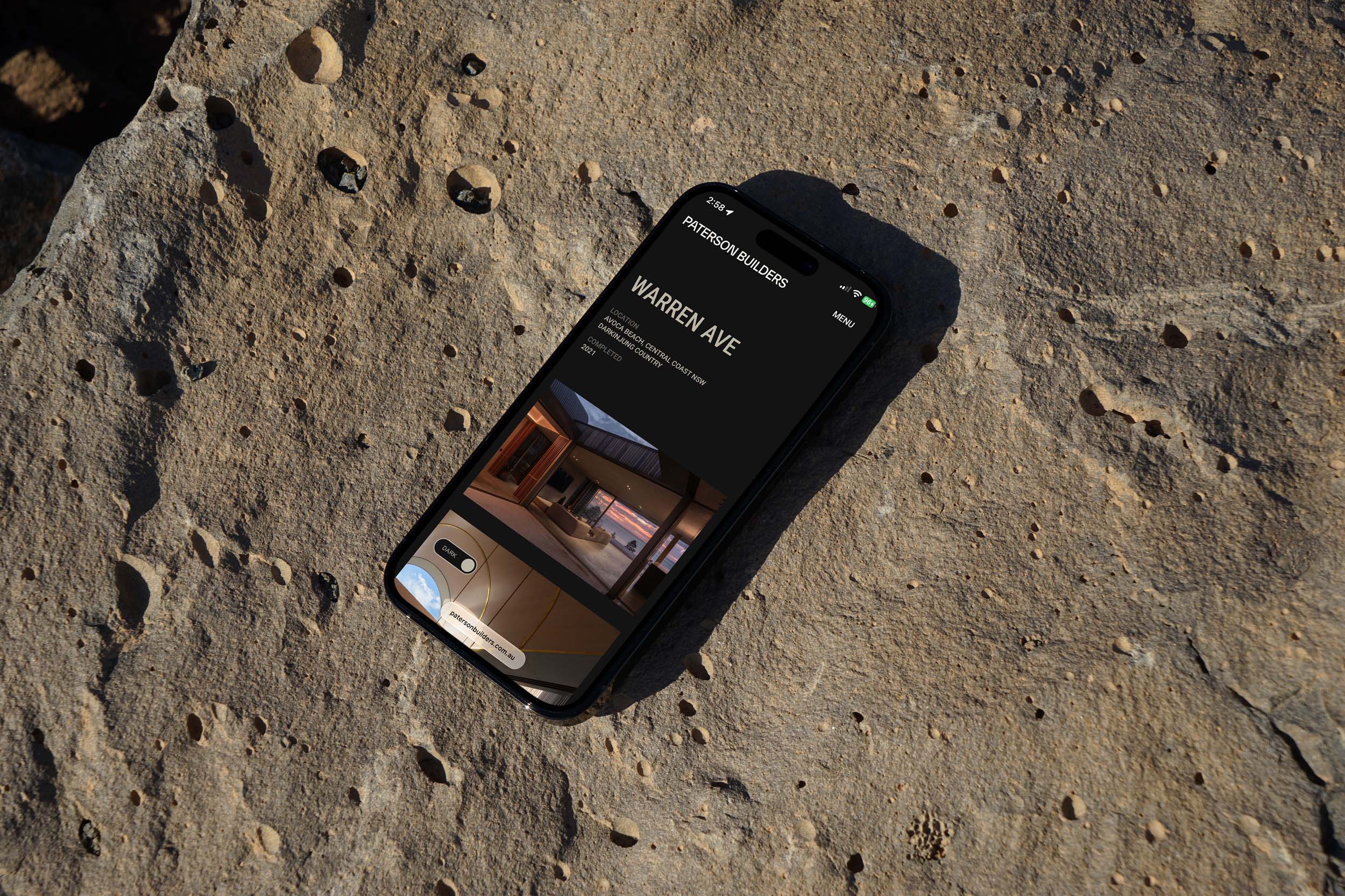 Paterson Builders website shown on a mobile phone