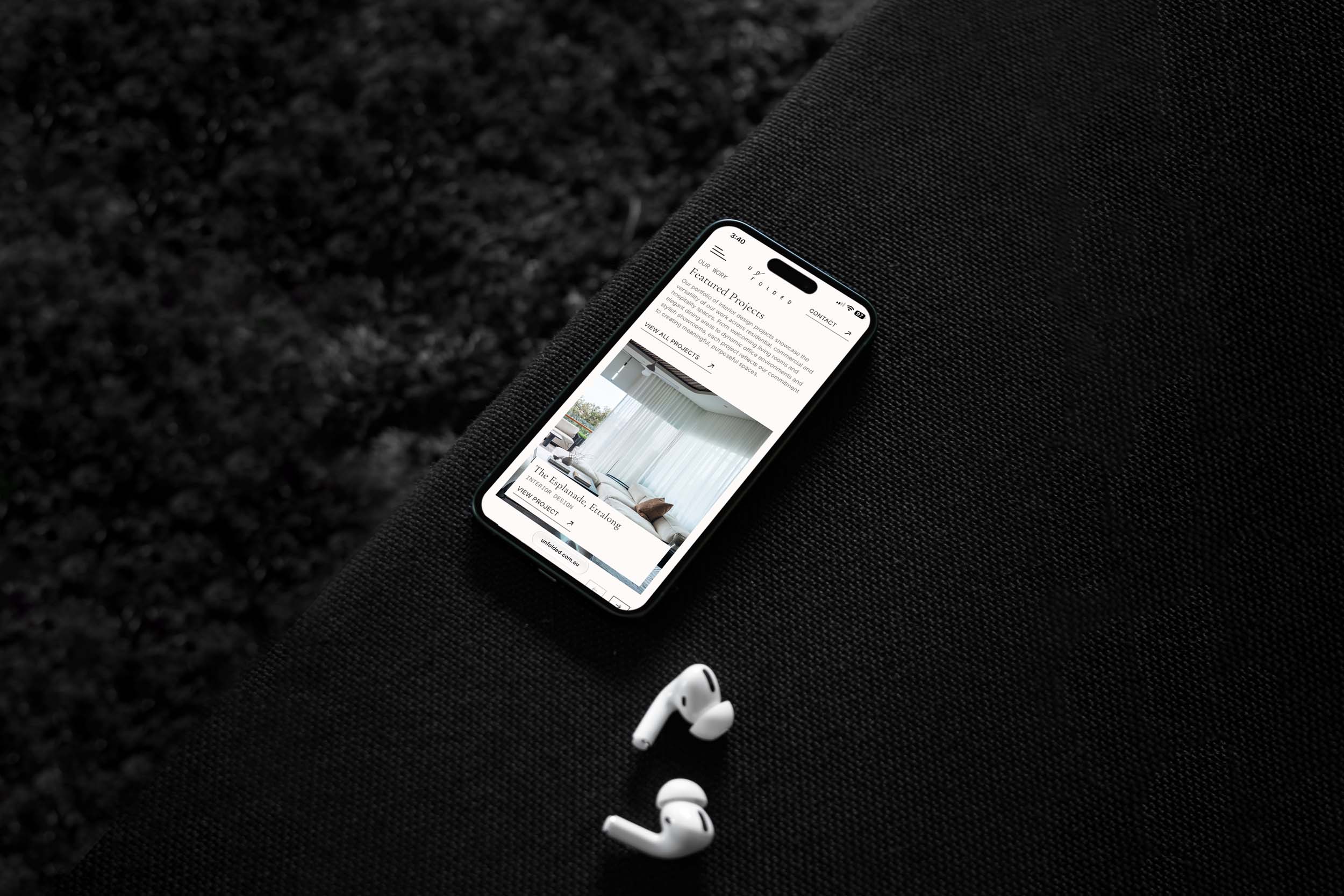 Unfolded website shown on a mobile phone